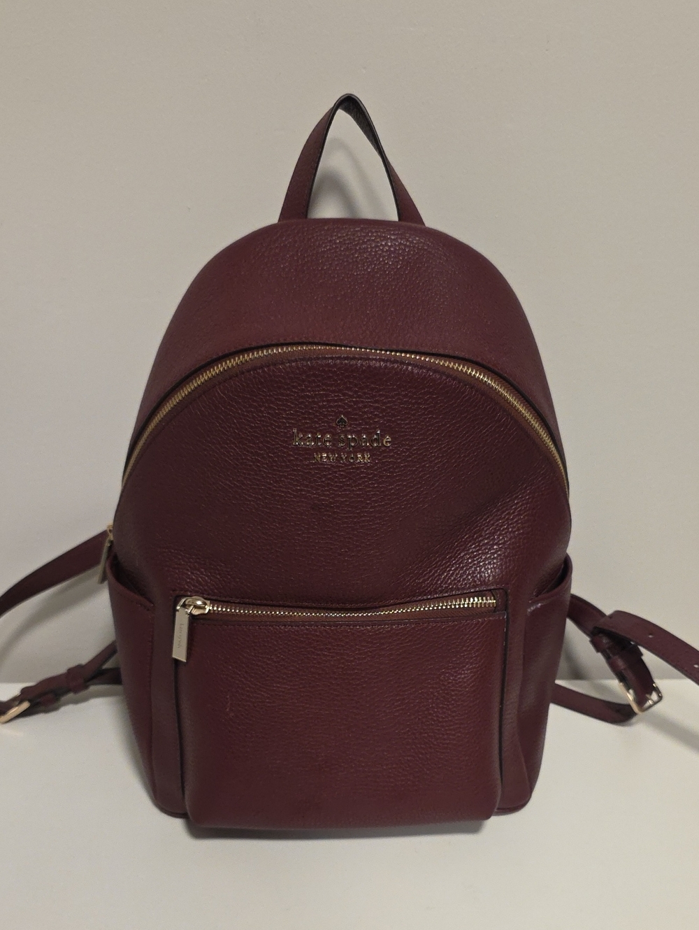 kate spade Leila Dome Leather Mini Backpack in Burgundy with Gold Hardware